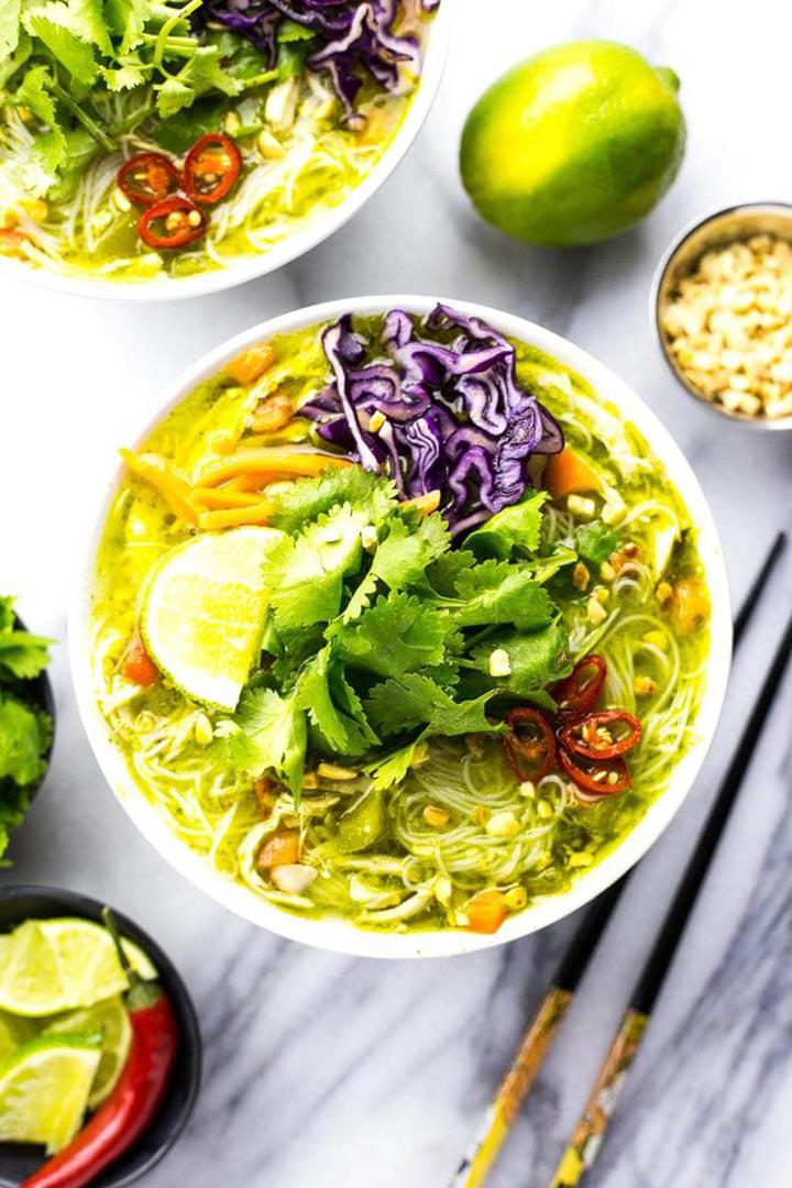 Green curry vermicelli bowl on marble background